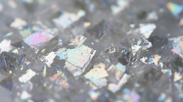 Ethereal Glittering Flow A dreamlike perspective of countless mica particles gracefully drifting and swirling, producing an effect of luminous, cosmic dust within a fluid environment.