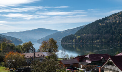 Peaceful Autumn Landscape Of Lake Izvorul Muntelui In Romanian Mountains