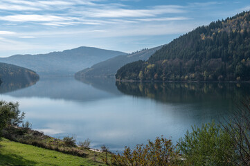 Peaceful Autumn Landscape Of Lake Izvorul Muntelui In Romanian Mountains