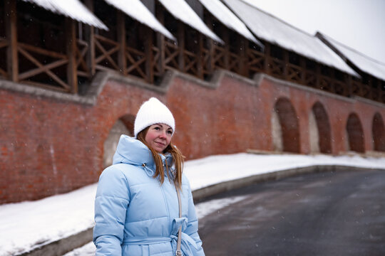 Winter Stroll Along the Historic Wall With Snowflakes Gently Falling in a Tranquil Setting - Powered by Adobe
