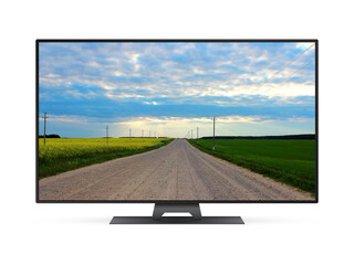 Fototapeta premium Flat screen TV with country road on screen isolated on white background