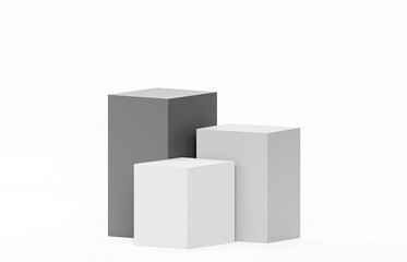 Obraz premium A minimalist product photography setup featuring two white cubes and one contrasting dark grey cube meticulously arranged on a flat white background