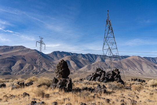 Trail to Little Lake Overlook, Coso Volcanic Field, Inyo County, California. Coso Range, Basin and Range Province. Volcanic rock, Basalt flows. Overhead power line

