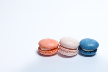Obraz premium Different color of macarons in isolated white background