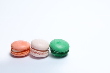Different color of macarons in isolated white background