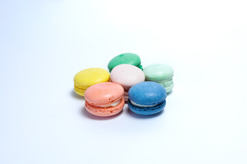 Obraz premium Different color of macarons in isolated white background