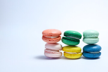 Obraz premium Different color of macarons in isolated white background