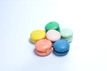 Different color of macarons in isolated white background