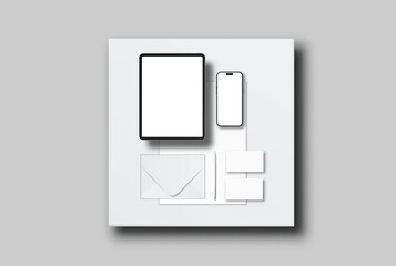 Minimal device and stationery mockup with smartphone, tablet, blank paper sheets, cards and pen arranged on light gray background. Clean flat lay layout for branding, UI presentation templates.