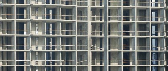 Floor Slabs And Concrete Walls Of Modern Apartment House In Construction Process. Panoramic Stock Photo For Construction Industry Backgrounds
