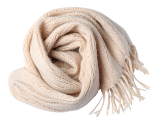 Soft, cream-colored knitted scarf with fringe, artfully swirled