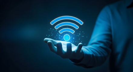 A person holding a glowing blue wi fi symbol in their hand with a dark background
