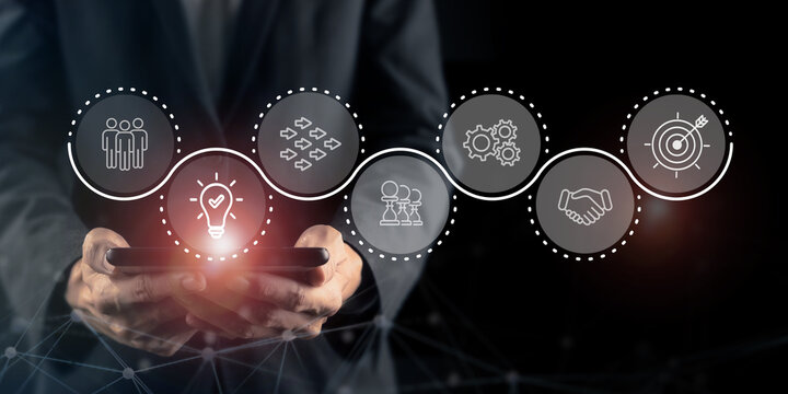 Product Idea Generation and Innovation. Using digital technology to generate product ideas, visualized through glowing icons representing creativity, strategy, teamwork and innovation in development.