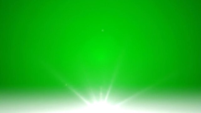 Bright white light flares emanate from the bottom, against a vibrant green background