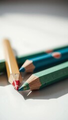 Obraz premium A still life of worn, colorful pencils, their tips softened by time, bathed in a gentle, dreamy light, sketch materials, bokeh effect