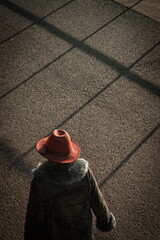 Woman with hat in winter walking