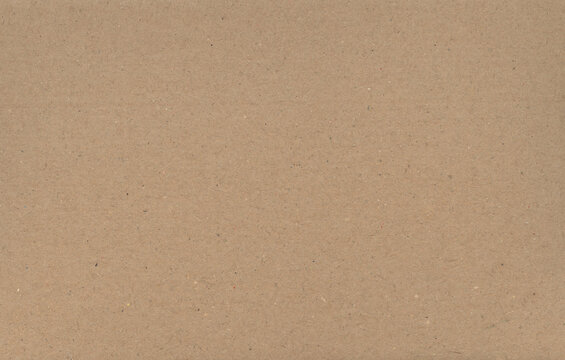 Blank vintage brown cardboard texture background with an old recycled kraft paper pattern on a rough aged surface