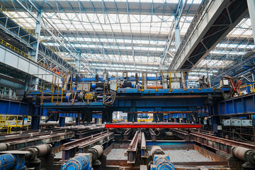 Fototapeta premium The fiery steel billet, the core moment of the rolling mill production line