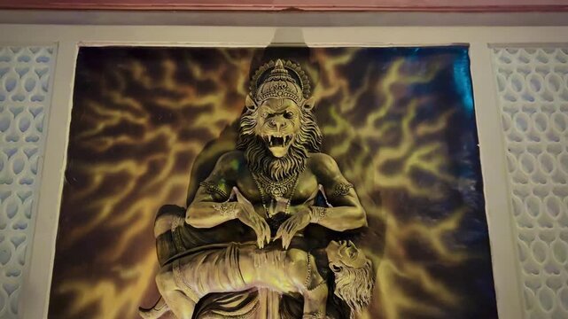 Dramatic sculpture of Lord Narasimha, the fierce avatar of Vishnu, symbolizing divine protection and victory over evil.