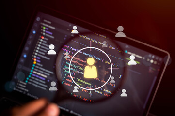 Fototapeta premium Digital user management concept with software source code on tablet screen, magnified profile icon, data connections and UI elements, representing authentication, cybersecurity, developer.