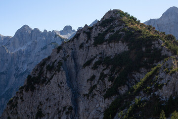 Man on the summit of a mountain in Theth National Park