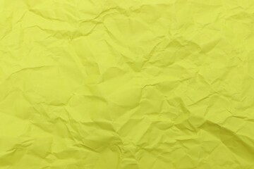 Wrinkled yellow paper pattern background