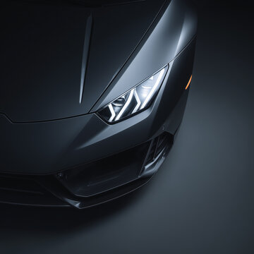 Moody close-up of sleek black supercar front with sharp LED headlight, highlighting luxury automotive design, speed, power, performance engineering, and modern elegance in dark studio lighting