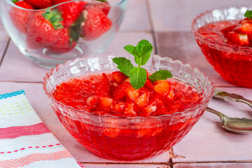 Homemade fruit jelly with fresh strawberries
