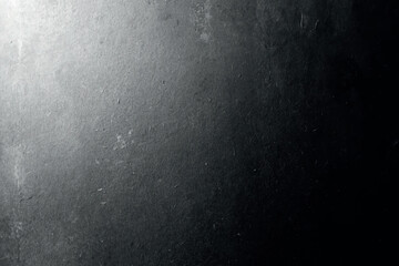 A monochrome image with a bright center fading into darker tones