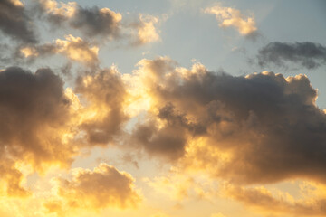 Beautiful bright orange sunset sky with clouds.