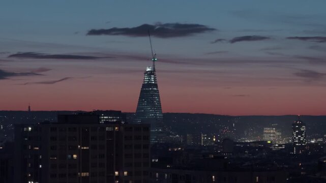 Sunset view of Paris skyline with Tour Triangle under construction