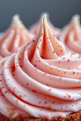 a close detail photograph of creamy dessert textures piped into smooth curves, pastel red tones, valentine aesthetic, studio lighting, no people, no text, refined macro food photography