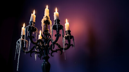 Candelabra with candles on dark background mysterious ambiance.