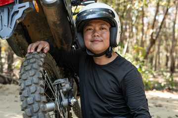 Happy Asian man with motorcycle, Smiling man wearing helmets, safety on motorbikes