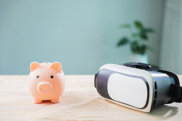 Piggy bank for money saving in metaverse banking, vr casino and ar world sits on wooden table for digital investment in future finance, highlighting immersive technology concept