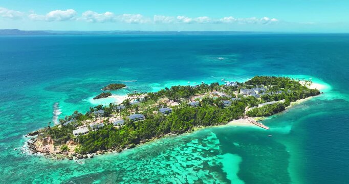 Exotic tropical island with palm trees and white sands in the ocean Exotic summer Getaway Dominican Republic aerial travel landscape