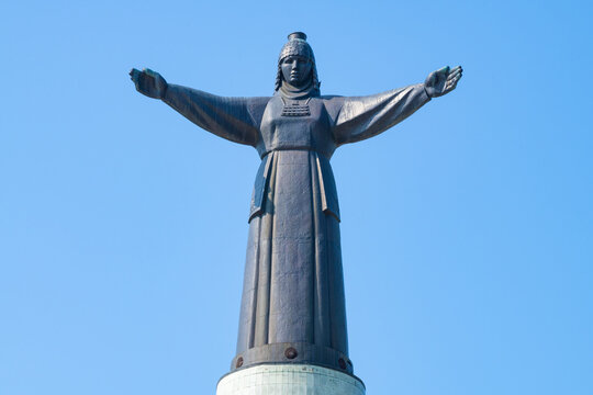 CHEBOKSARY, RUSSIA - SEPTEMBER 03, 2024: Sculpture of the Mother Patroness of the Chuvash people is close-up against the blue sky. Cheboksary