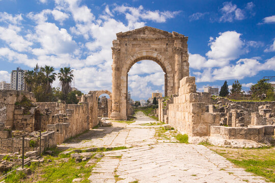 The huge Triumphal Arch (built 2nd century) dominating the wide ancient Roman and Byzantine avenue leading to the old city in Al-Bass necropolis archeological site. Tyre (Sour), Lebanon
