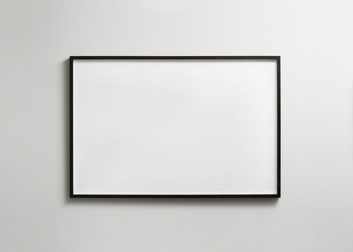 Blank horizontal picture frame mockup on white wall minimal interior
