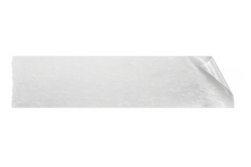 Clear adhesive tape fragment with a mildly wrinkled surface and ragged edges, forming a transparent sticky layer