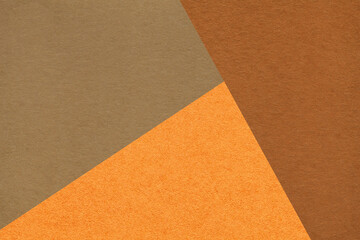 Fototapeta premium Geometric brown orange rust texture paper background with copy space for presentation, banner template