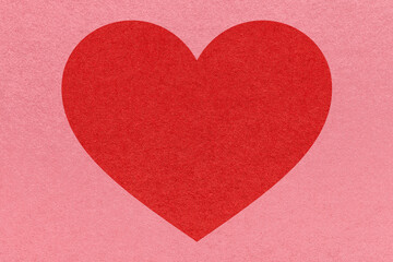 Fototapeta premium Red heart on pink paper texture background with copy space for Valentines Day banner, template or greeting card