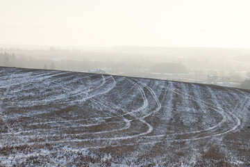 Fototapeta premium Winter field landscape with no people, abstract winter view