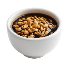 Small white bowl filled with dark liquid and roasted peanuts on top