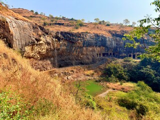 Fototapeta premium Hindu rock cut cave temples at Ellora Caves, Maharashtra, India, UNESCO World Heritage religious site 