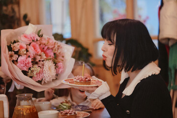 bouquet of flowers mom daughter and grandma family women's party in a cafe, Greetings to the family