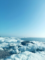 Frozen ice on a sea background
