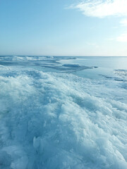 Frozen ice on a sea background