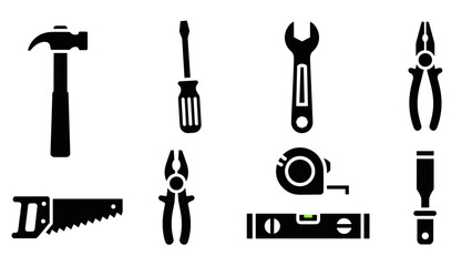 Silhouette set of essential hand tools black icons for construction projects