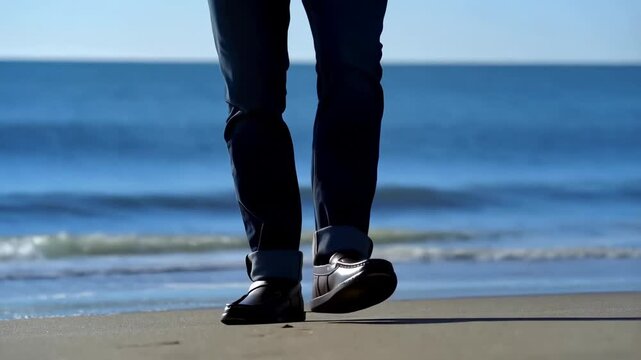 Casual stroll on serene beach capturing peaceful moments by the ocean